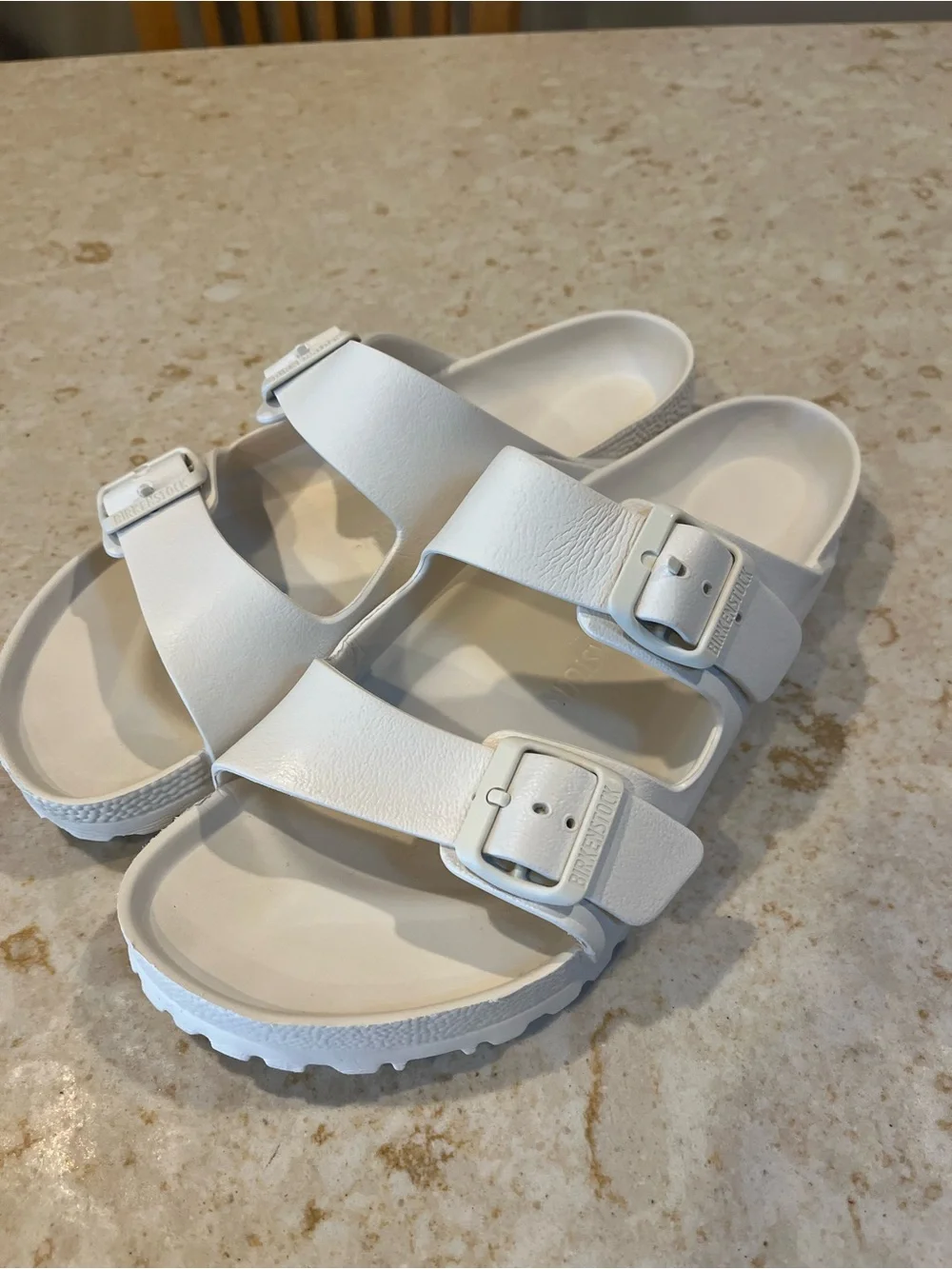 Authentic Birkenstock Arizona Essentials EVA sandals in classic white